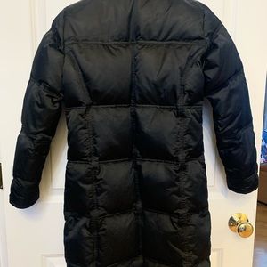 Long black down filled girls coat.
